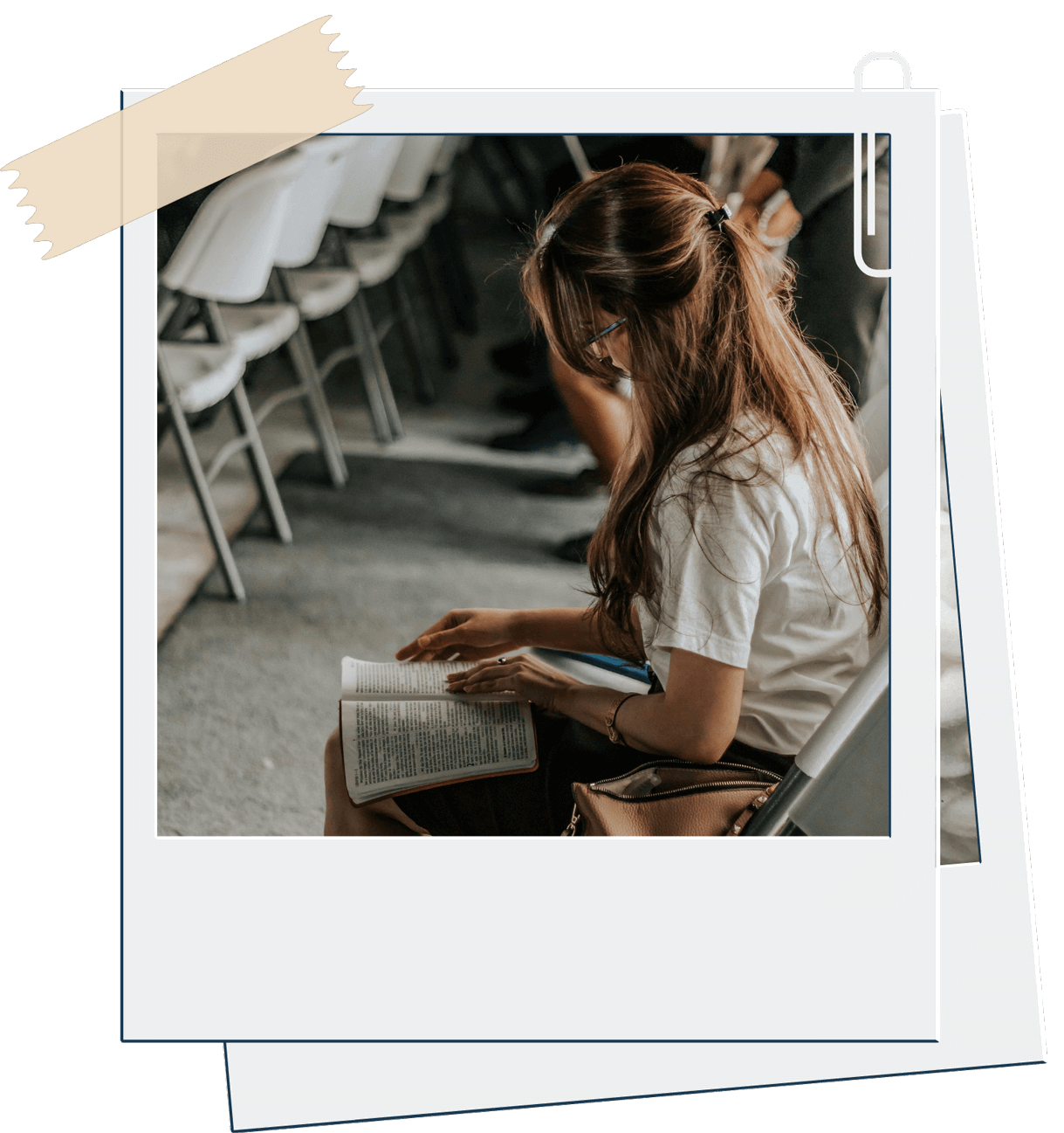 Woman reading - stack of polaroid photos